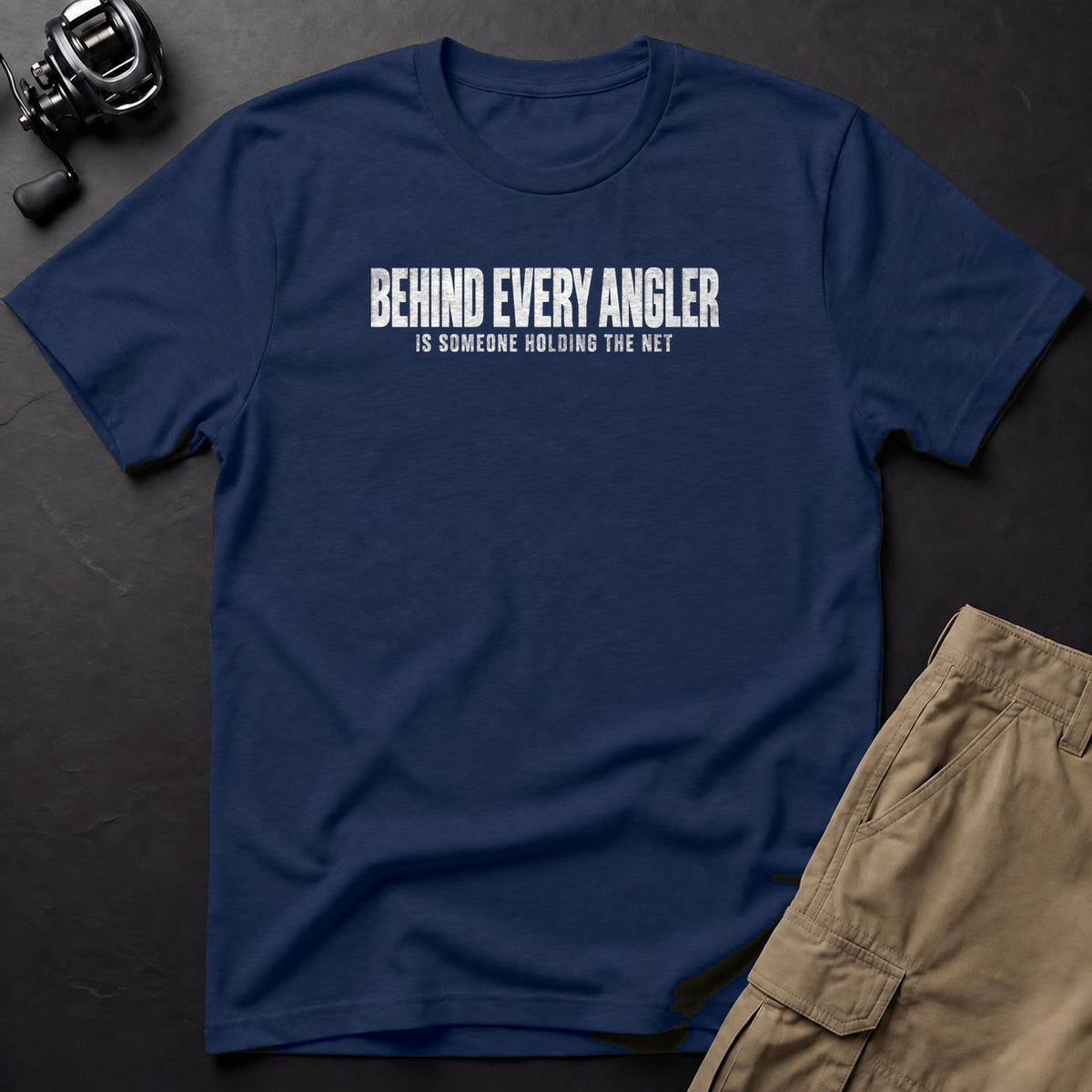 Behind Every Angler Is Someone Holding the Net T-Shirt — True Navy